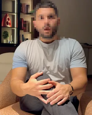 A frame of the clip to edit: a person talking in the room